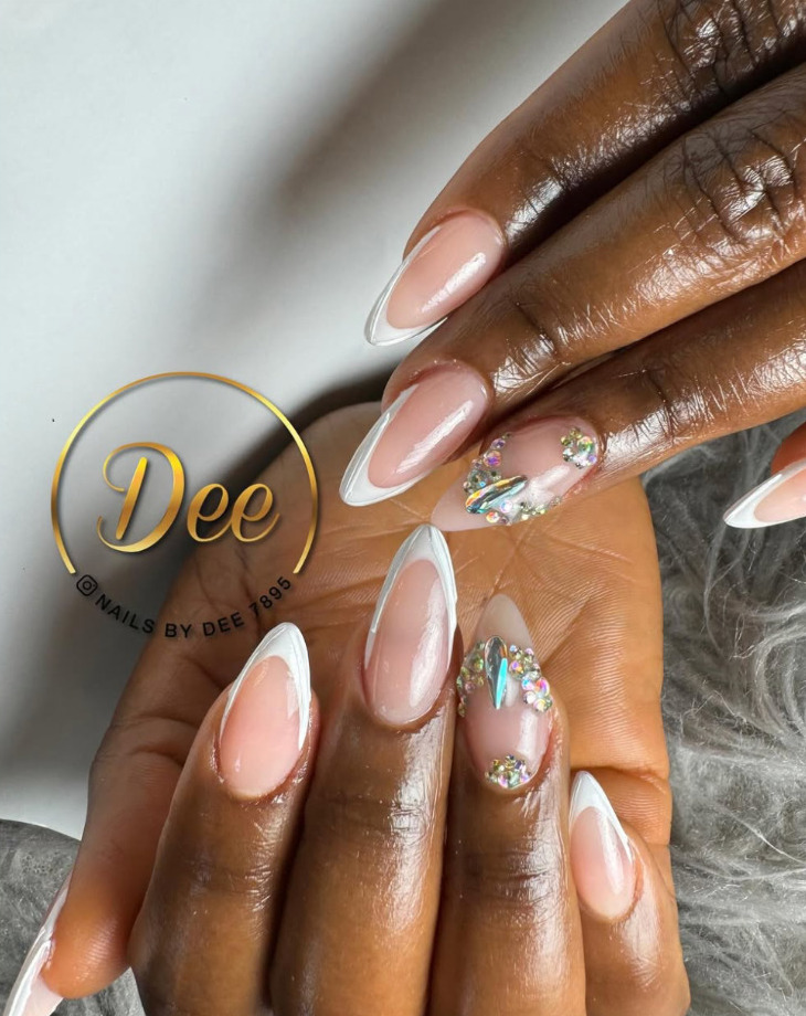Elegant French tip nail design with crystals by Nails by Dee